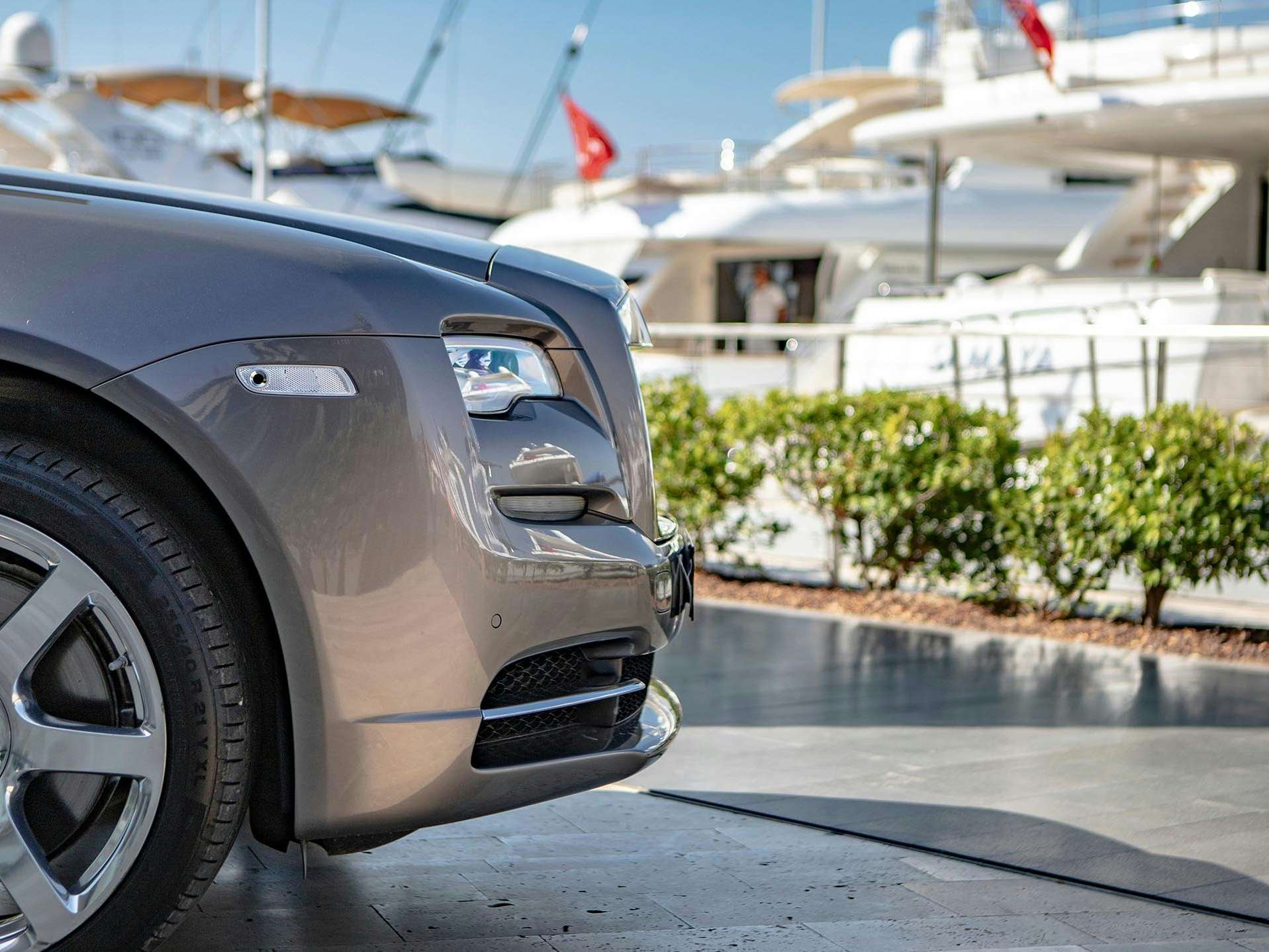 Luxury Car Luxury car parked at superyacht marina