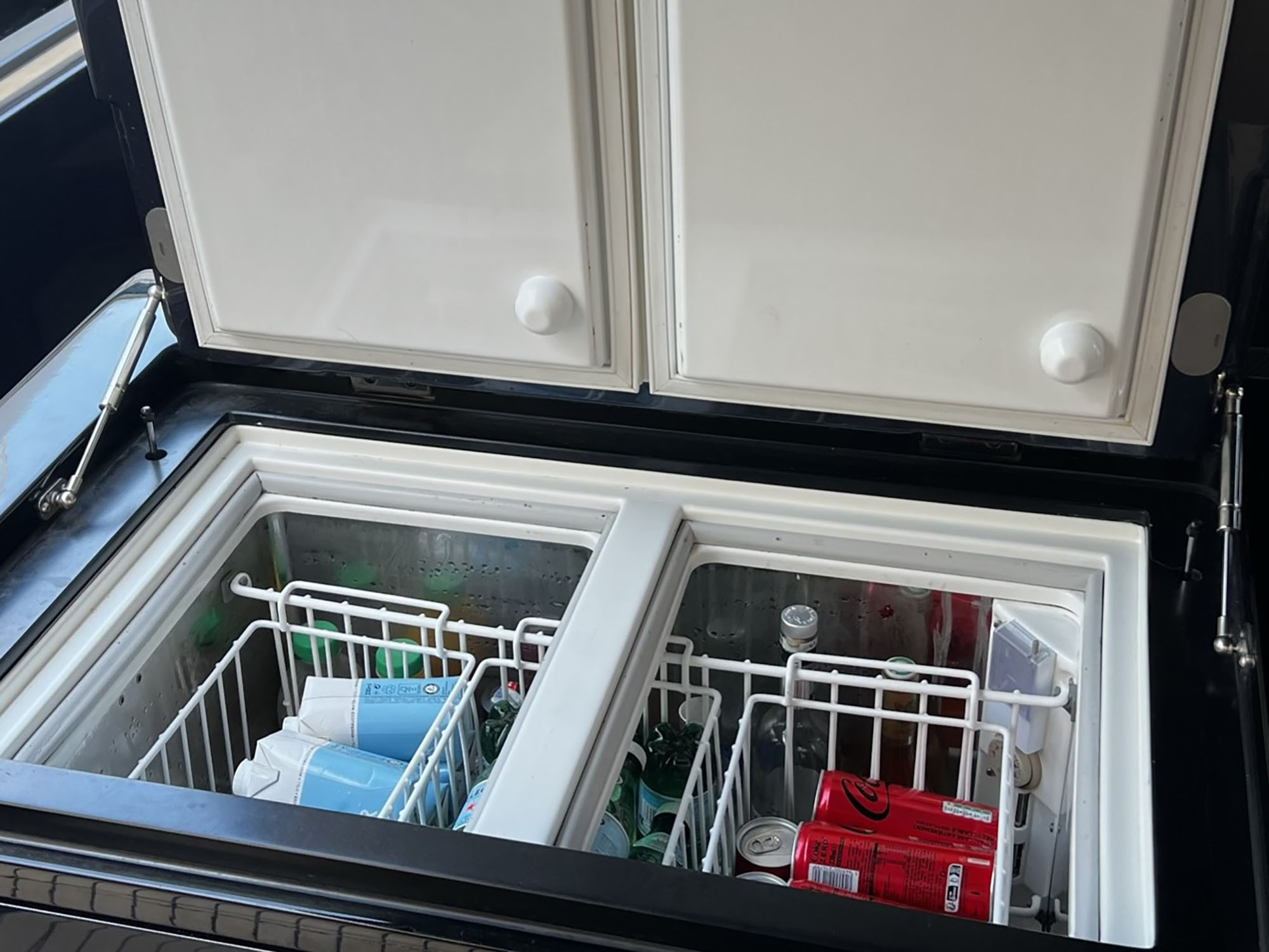 Boat fridge stocked with beverages