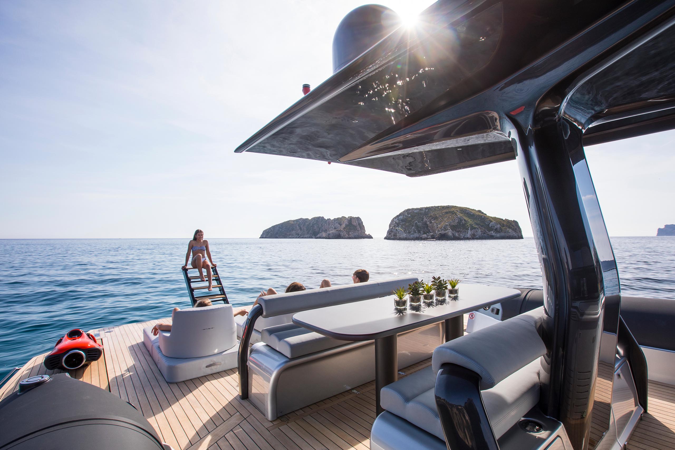 Fast boat anchored in the mediterranean sea with guests on board